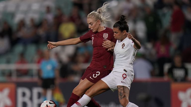 Alex Greenwood and Ana Borges battle for the ball