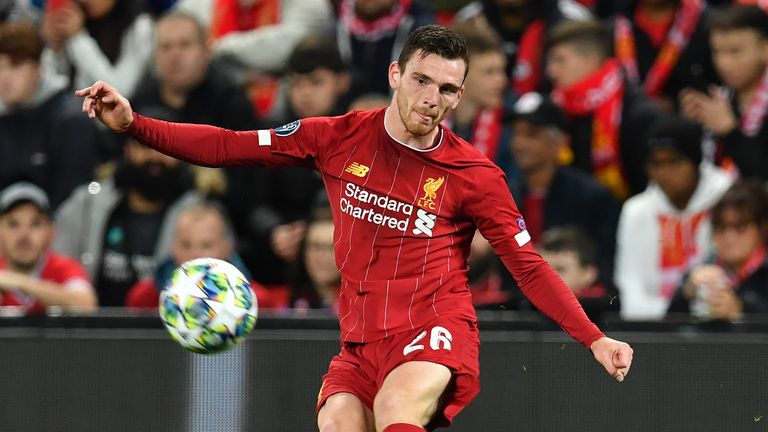 Liverpool&#39;s Scottish defender Andrew Robertson crosses the ball during the UEFA Champions league Group E football match between Liverpool and Salzburg at Anfield in Liverpool, north west England on October 2, 2019.