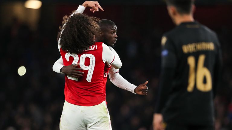 Arsenal celebrate Nicolas Pepe's late winner against Vitoria Guimares