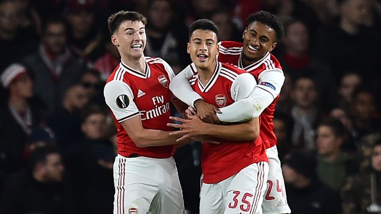 Gabriel Martinelli celebrates his second goal against Standard Liege