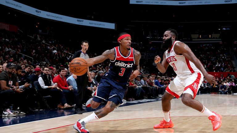 Bradley Beal of the Washington Wizards drives to the basket against the Houston Rockets