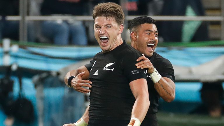 Beauden Barrett is congratulated by team-mate Richie Mo'unga after scoring his try