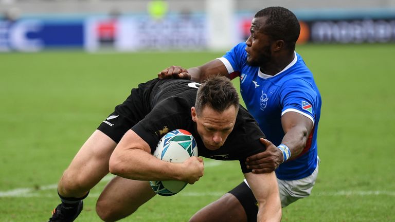New Zealand's full back Ben Smith scores a try during the Japan 2019 Rugby World Cup Pool B match between New Zealand and Namibia at the Tokyo Stadium in Tokyo on October 6, 2019. (