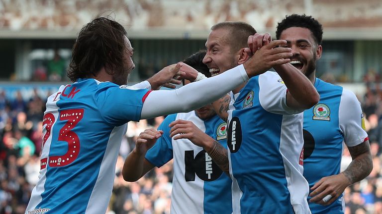 Bradley Dack celebrates with Lewis Holtby after making it 2-1