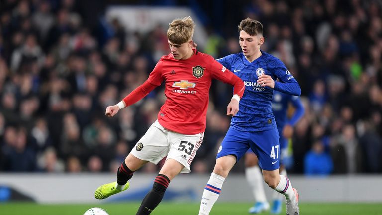 Brandon Williams of Manchester United is challenged by Chelsea's Billy Gilmour