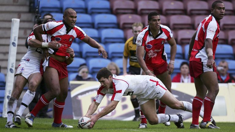 WIDNES, ENGLAND - NOVEMBER 12: Brett Ferres of England scores a try during the Federation Shield Final between England and Tonga at the Halton Stadium on November 12, 2006 in Widnes, England. (Photo by Matthew Lewis/Getty Images)