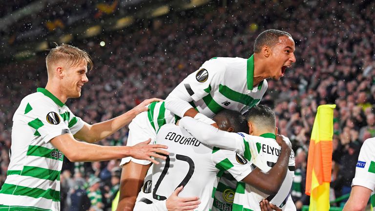 Celtic players celebrate a goal against Cluj