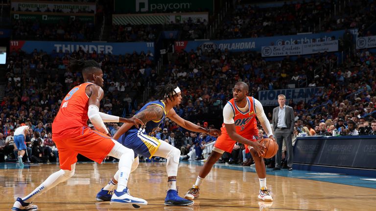Chris Paul of the Oklahoma City Thunder handles the ball against the Golden State Warriors
