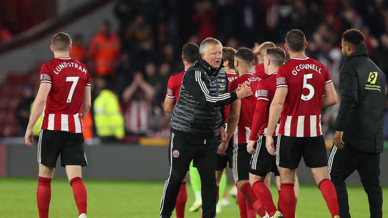 SHEFFIELD, ENGLAND - OCTOBER 21: Chris Wilder the head coach / manager of Sheffield United congratulates his players after the 1-0 victory during the Premier League match between Sheffield United and Arsenal FC at Bramall Lane on October 21, 2019 in Sheffield, United Kingdom. (Photo by James Williamson - AMA/Getty Images)