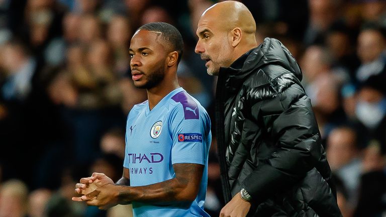 Pep Guardiola gives Raheem Sterling some instructions during Manchester City's 2-0 win over Dinamo Zagreb
