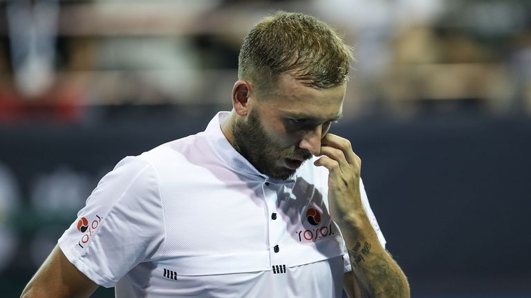 Dan Evans of Great Britain returns a shot against Li Zhe of China during Men's singles first round of 2019 China Open at the China National Tennis Center on September 30, 2019 in Beijing, China. 