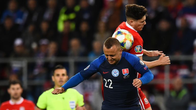 Daniel James outjumps Stanislav Lobotka