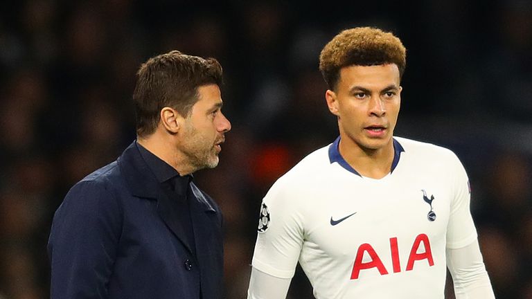 Tottenham Hotspur manager Mauricio Pochettino speaks with Dele Alli during the UEFA Champions League Quarter Final first leg match between Tottenham Hotspur and Manchester City at Tottenham Hotspur Stadium on April 09, 2019 in London, England. 