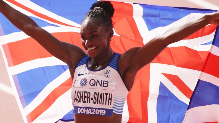 DIna Asher-Smith celebrates after winning the world 200m
