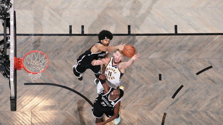 Domantas Sabonis of the Indiana Pacers grabs the rebound against the Brooklyn Nets