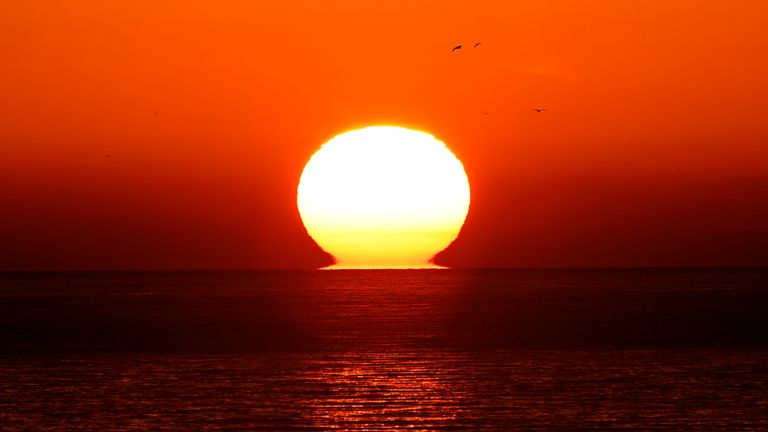 DOVER, ENGLAND - DECEMBER 28: The sun sets over the English Channel as calm sea waters continue on December 28, 2018 in Dover, England. The growing number of migrants attempting to cross the English Channel has been declared a "major incident" by UK home secretary Sajid Javid. (Photo by Christopher Furlong/Getty Images)