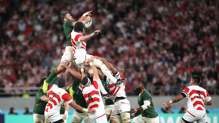 Duane Vermeulen of South Africa and James Moore of Japan compete for the ball at the lineout