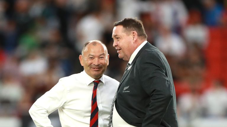 YOKOHAMA, JAPAN - OCTOBER 26: Coaches Eddie Jones (L) of England and Steve Hansen of New Zealand enjoy a laugh during the Rugby World Cup 2019 Semi-Final match between England and New Zealand at International Stadium Yokohama on October 26, 2019 in Yokohama, Kanagawa, Japan. (Photo by David Rogers/Getty Images)