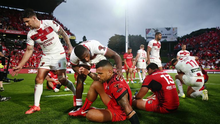 Sika Manu of Tonga is comforted by Jermaine McGillvary of England after the match. 2017 Rugby League World Cup Semi Final, England v Tonga at Mt Smart Stadium, Auckland, New Zealand. 25 November 2017 .. Copyright Photo: Anthony Au-Yeung / www.photosport.nz
