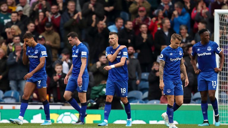 Everton players react after their defeat to Burnley