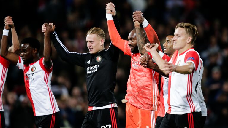 Feyenoord's players celebrate their win over Porto at full-time