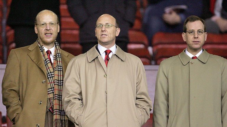 Kevin Glazer (r) at Old Trafford with two of his brothers