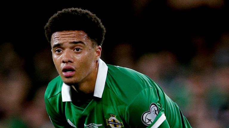 Lewis has been named in the Northern Ireland despite an elbow injury