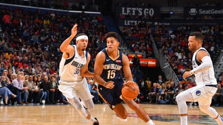 Frank Jackson of the New Orleans Pelicans handles the ball against the Dallas Mavericks