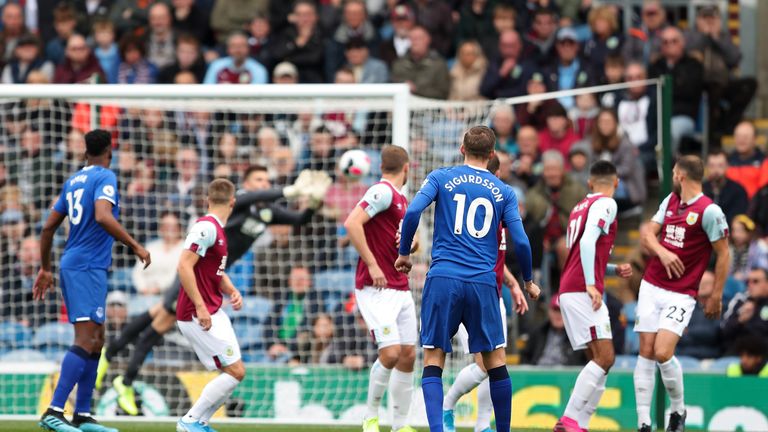 Gylfi Sigurdsson sees his early free-kick tipped around the post by Nick Pope