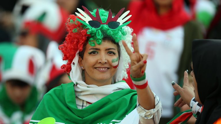 An Iranian woman shows her support at her country’s World Cup qualifier against Cambodia