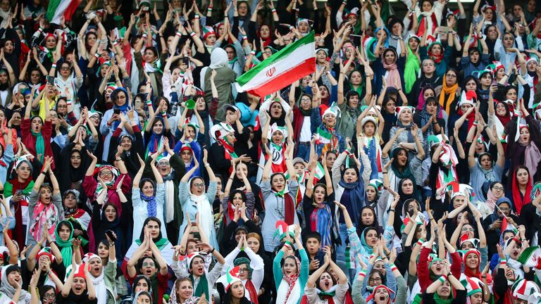 Iranian women cheer during the World Cup 2022 Group C qualification match