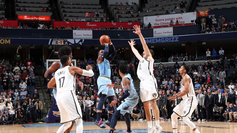 Jae Crowder of the Memphis Grizzlies shoots the 3-point game winning shot against the Brooklyn Nets