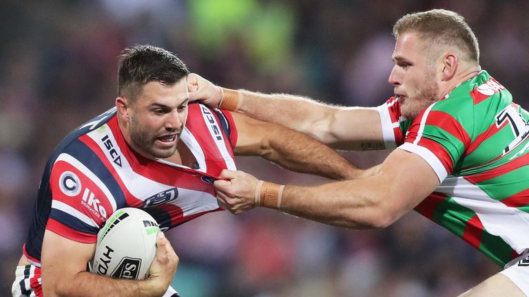 SYDNEY, AUSTRALIA - SEPTEMBER 13: James Tedesco of the Roosters is tackled by Tom Burgess of the Rabbitohs during the NRL Qualifying Final match between the Sydney Roosters and the South Sydney Rabbitohs at Sydney Cricket Ground on September 13, 2019 in Sydney, Australia. (Photo by Matt King/Getty Images)