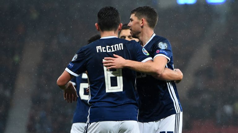 Scotland&#39;s midfielder John McGinn (C) celebrates with teammates after scoring the opening goal of the Euro 2020 football qualification match between Scotland and San Marino at Hampden Park, Glasgow on October 13, 2019. (Photo by ANDY BUCHANAN / AFP) (Photo by ANDY BUCHANAN/AFP via Getty Images)
