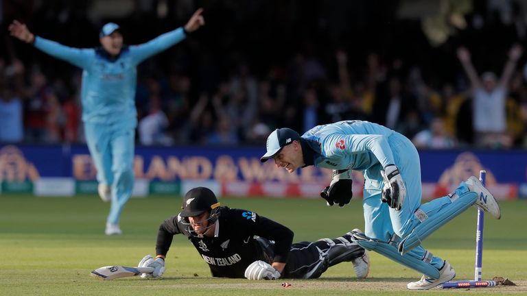 Jos Buttler runs out Martin Guptill off the final ball of the superover to give England victory during the England v New Zealand ICC Cricket World Cup Final 2019 at Lords Cricket Ground on July 14th 2019 in London (Photo by Tom Jenkins) 