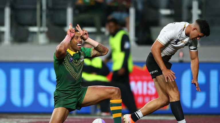 SYDNEY, AUSTRALIA - OCTOBER 18: Josh Addo-Carr of Australia celebrates scoring a try during the round one Rugby League World Cup 9s match between Australia and New Zealand at Bankwest Stadium on October 18, 2019 in Sydney, Australia. (Photo by Matt Blyth/Getty Images)