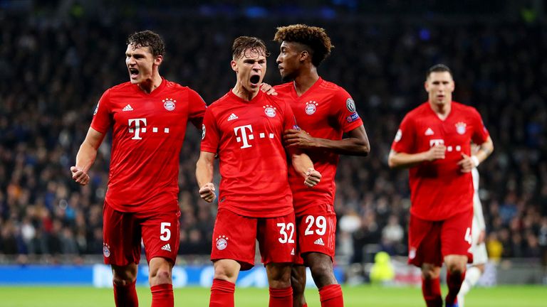 Joshua Kimmich (centre) celebrates with team-mates Benjamin Pavard and Kingsley Coman