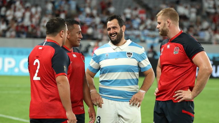 Juan Figallo of Argentina is consoled by England players after the Rugby World Cup 2019 Group C game between England and Argentina at Tokyo Stadium on October 05, 2019 in Chofu, Tokyo, Japan. (