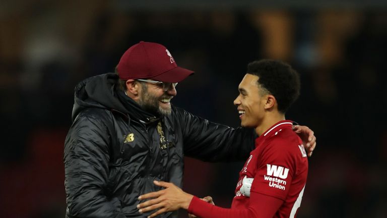 Jurgen Klopp, Manager of Liverpool congratulates scorer of the second goal, Trent Alexander-Arnold following the Premier League match between Watford FC and Liverpool FC at Vicarage Road on November 24, 2018 in Watford, United Kingdom. (