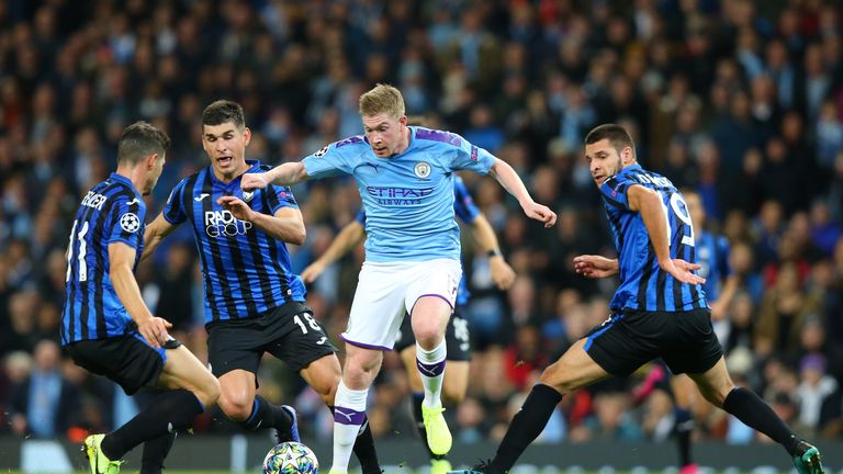 Kevin De Bruyne escapes four Atalanta players during another fine display