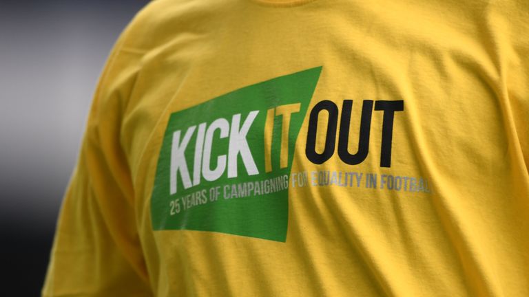 Detail of a 'Kick it Out' t-shirt worn by players in the Premier League