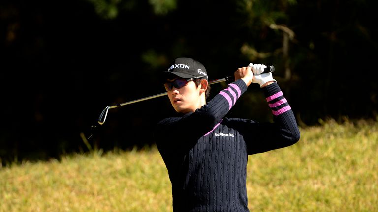 Kim Bi-o of Korea takes a shot on the course during the Pro-Am competition of the Kolon Korea Open at Woo Jeong Hills Country Club near Cheonan, on 16 October 2013. The one billion won (around U.S. $950,000) tournament is part of the OneAsia circuit. 