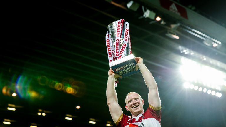 Picture by Alex Whitehead/SWpix.com - 13/10/2018 - Rugby League - Betfred Super League Grand Final - Wigan Warriors vs Warrington Wolves - Old Trafford, Manchester, England - Wigan's Liam Farrell celebrates with the trophy.