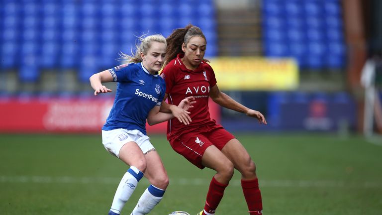 BIRKENHEAD, ENGLAND - DECEMBER 16: Jess Clarke of Liverpool Ladies battles Faya Bryson of Everton Ladies FC during the FA Continental Tyres Cup match between Liverpool FC and Everton Ladies FC at Prenton Park on December 16, 2018 in Birkenhead, England. (Photo by Jan Kruger/Getty Images)