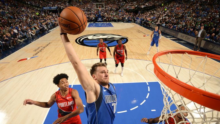Luka Doncic of the Dallas Mavericks dunks the ball against the Portland Trail Blazers