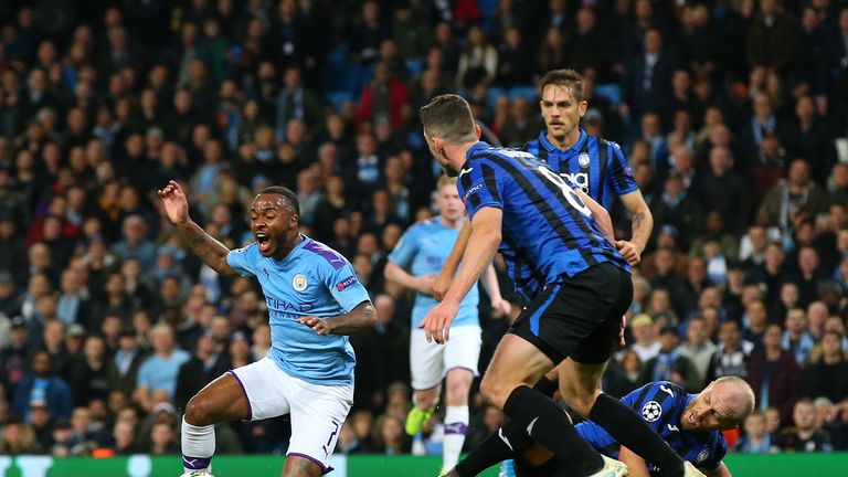 Raheem Sterling goes down inside the box to give City the chance to make it 2-1