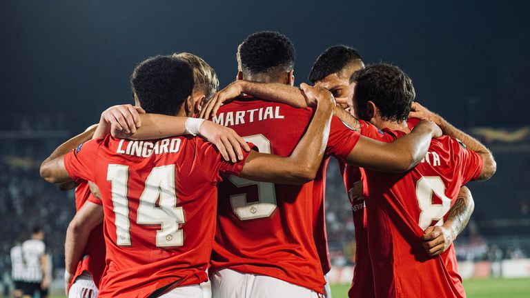 Manchester United players celebrate Anthony Martial's opener against Partizan Belgrade
