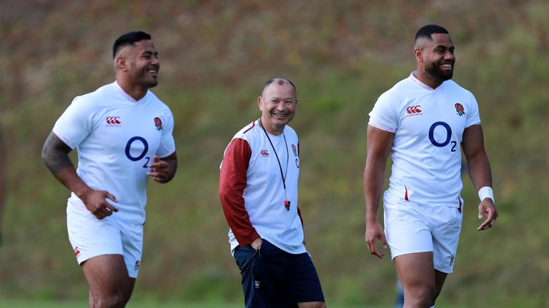 Eddie Jones watches on as Manu Tuilagi takes part in England training