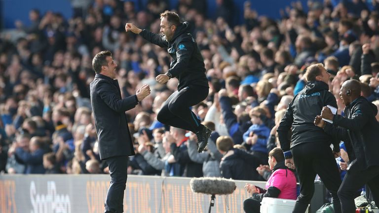 Marco Silva celebrates with a member of his coaching staff after Bernard's goal