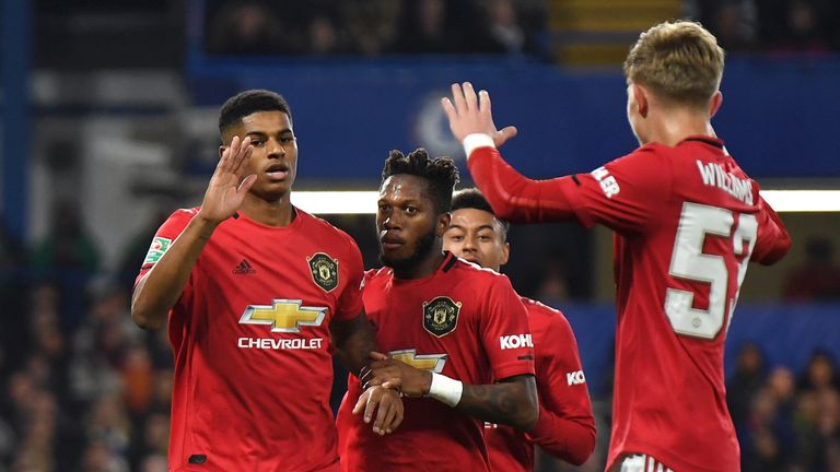 Marcus Rashford celebrates after scoring his penalty to put Manchester United ahead